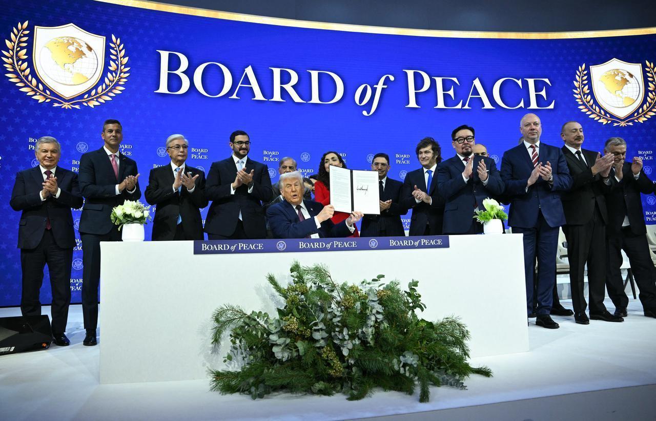 Leaders around the world hold a signing of the founding charter at the