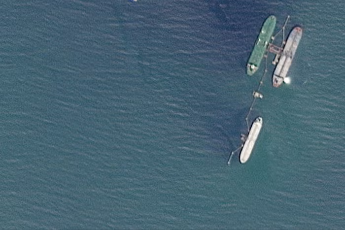 Satellite image shows several large loading at sea